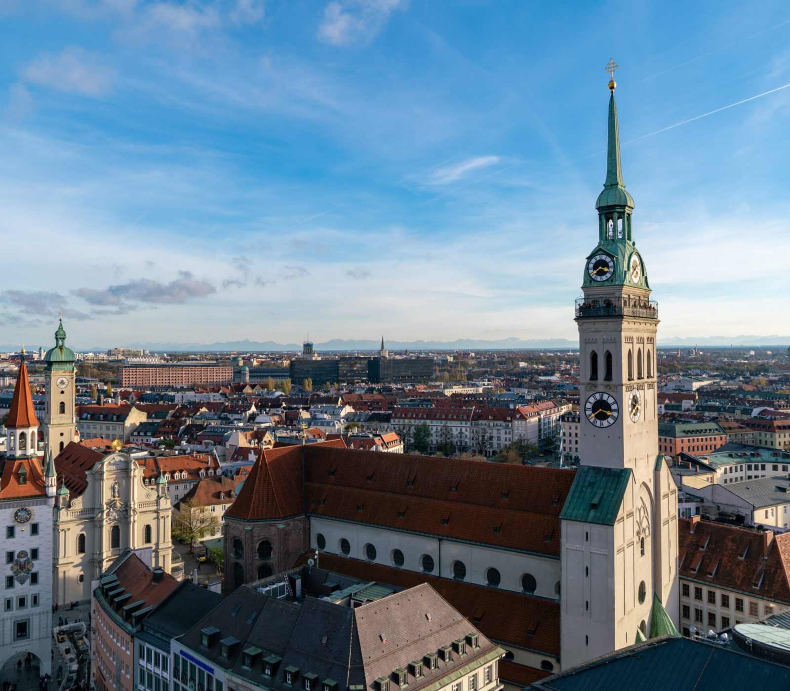 Clock Tower Rush: Munich from the Air. Gothic Tower Rush Hour: Aerial Views of Munich's Architectural Gems.