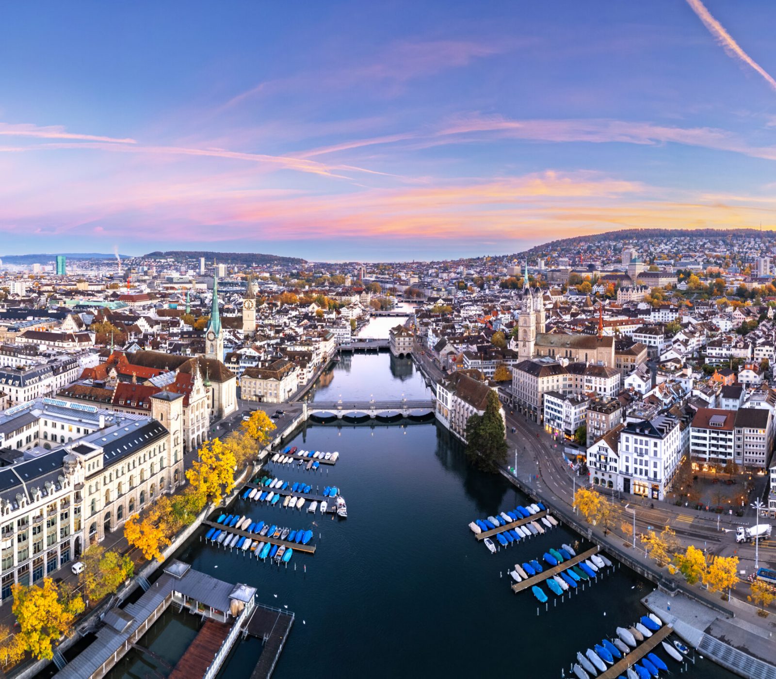 Zurich, Switzerland old town skyline over the Limmat River on an autumn morning.